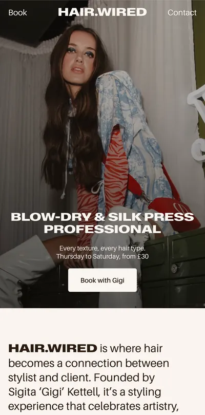 HAIR.WIRED mobile homepage: a portrait of a model under the headline “Blow-dry & silk press professional”, with a Book with Gigi button